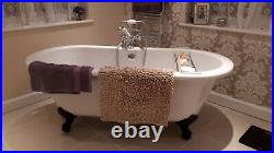 Evesham roll top bath with black feet including tap