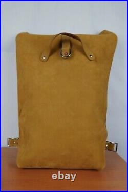 Handmade custom made full grain leather roll top backpack made in usa