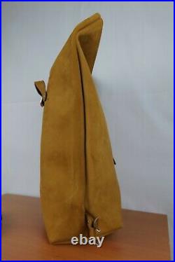 Handmade custom made full grain leather roll top backpack made in usa