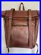 NWT_Genicci_Jason_Roll_Top_Cognac_Leather_Double_Buckle_Backpack_01_xucy
