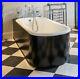 Roll_Top_Bath_With_Black_Curved_Surround_01_pjh