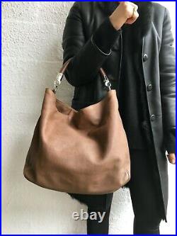 YVES SAINT LAURENT Roady Leather Tan Hobo Bag With Rolled Top Shoulder Strap